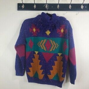 Spice of life vintage aztec print turtle neck with tassles size medium